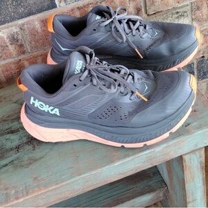 HOKA One One woman  sneakers 9W.   Orange and Gray.